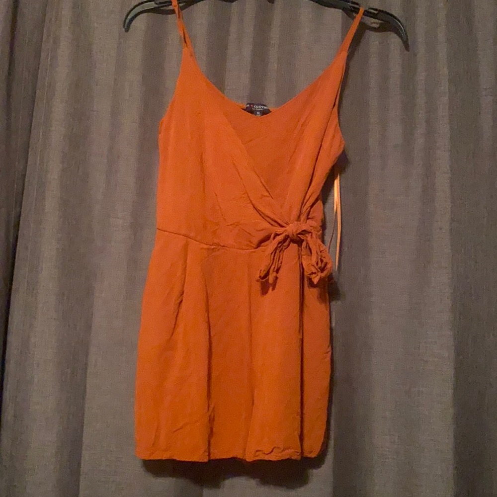 Romper. Burnt orange. Size small